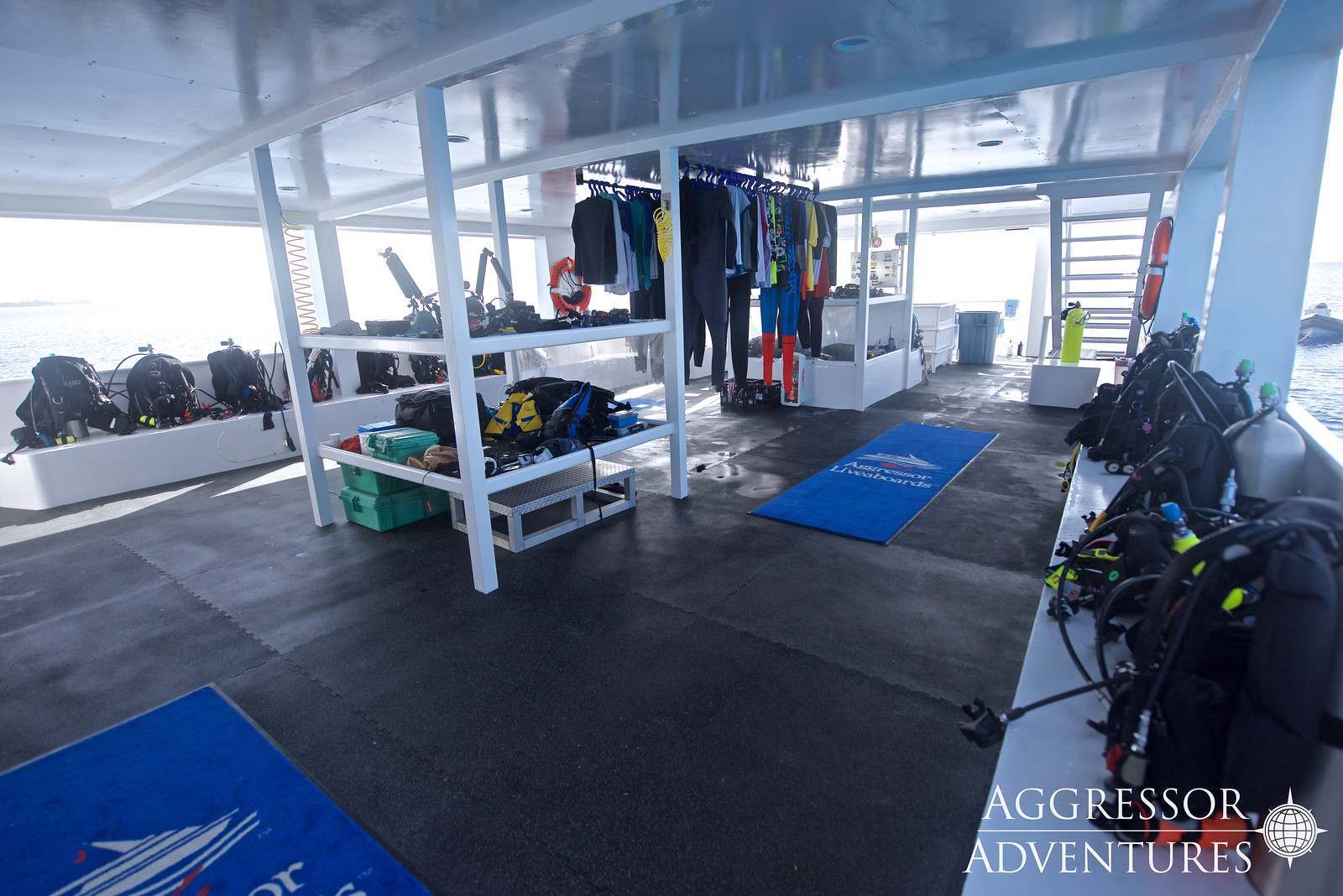 Scuba equipment is lined up on the Cayman Aggressor V